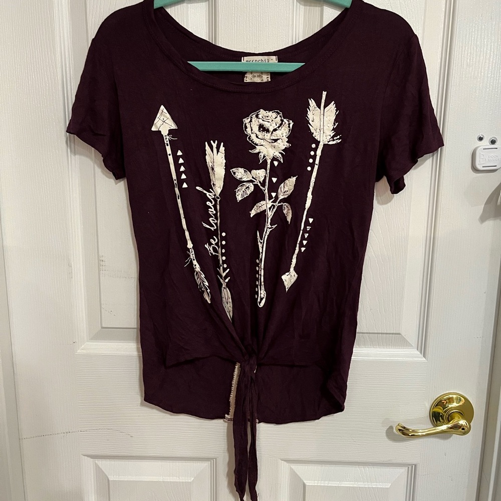 Burgundy blouse with white design